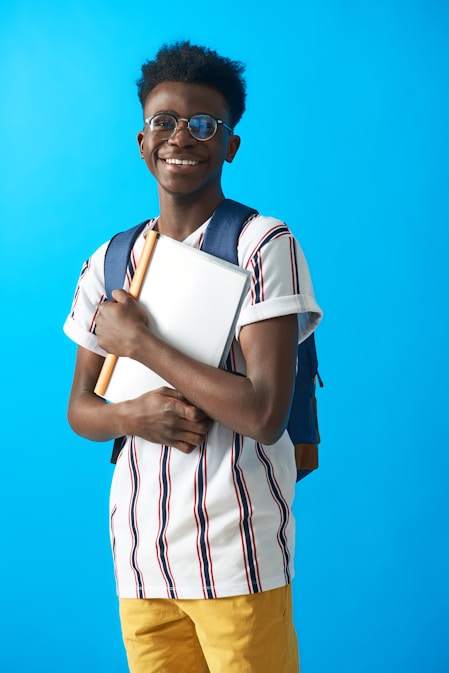 Student holding a smart school ID card